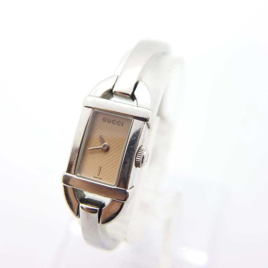 Montre femme Gucci 6800L quartz carré 15 mm vintage beige fabrication suisse