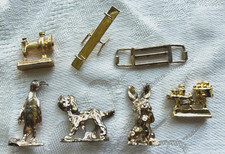 7 Vntg Mini Gold Tone Figures: SeeSaw Dog Bunny Penguin Exerciser Sew-Mach. 1-2"