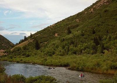 Rafters enjoy a ride down the Provo River in Provo Canyon, near Orem, Utah