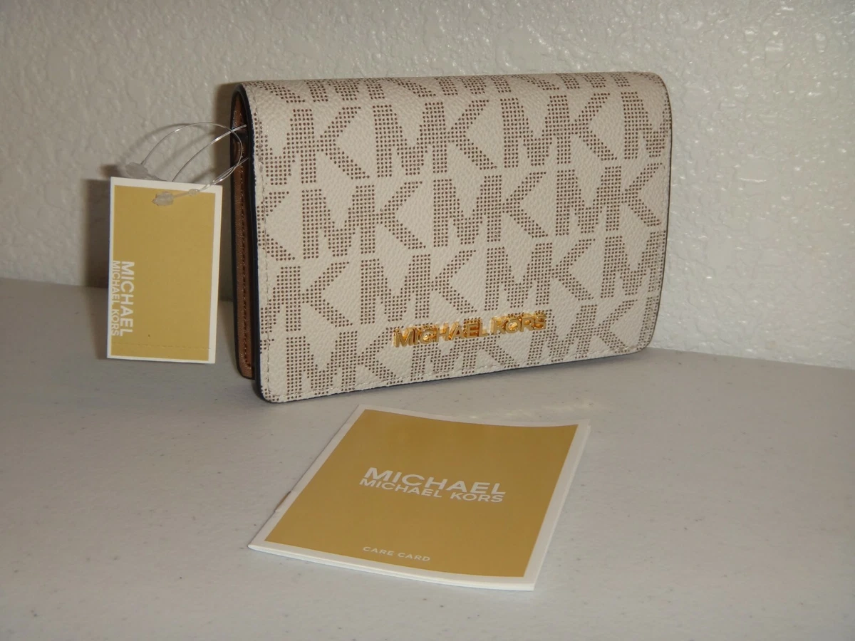 Logo slim on sale wallet michael kors