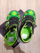 SKECHERS Creature Lights Dino Kinder Sandalen...