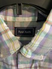 Men’s long-sleeve button-up shirt with pastel plaid pattern, featuring a black Ryan Keith label on the inner collar.