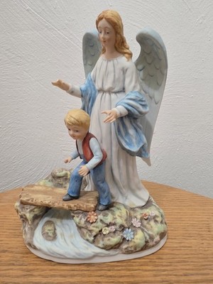 Ceramic Excelsis Statue