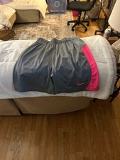 Nike youth s Dri -Fit Athletic Mesh Shorts Grey with Pink Swoosh and Stripe