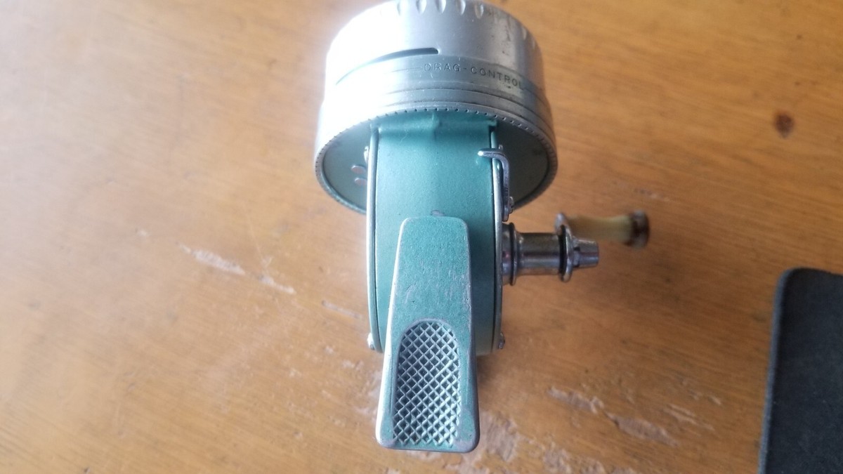 Ancien coude sud n° Moulinet 77 Spin Cast Made in USA