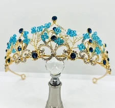 Golden tiara with blue rhinestones beads Golden tiara with blue rhinestones