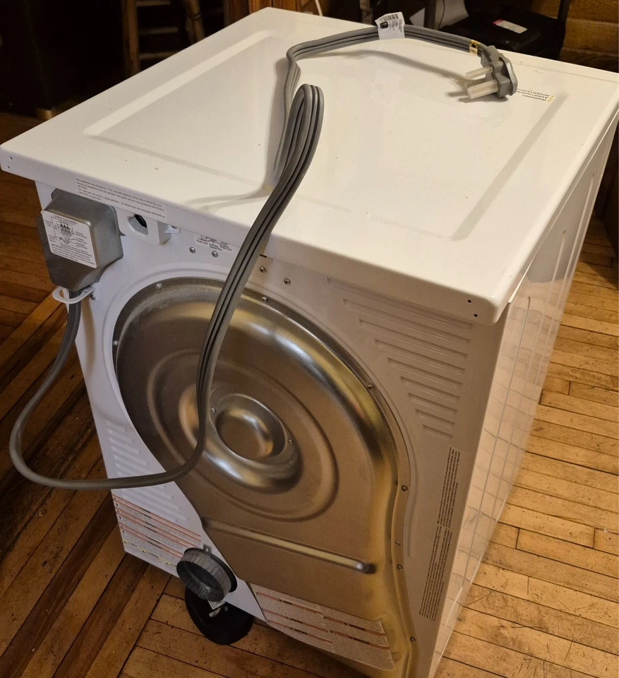 Secadora eléctrica apilable carga frontal ventilada GE GFD14ESSNWW 24" 4,3 pies cúbicos en blanco Foto 4 de 4