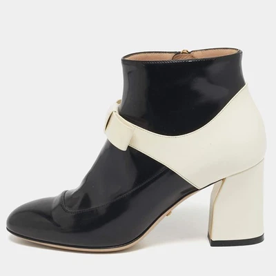 Bottines Gucci taille 36 en cuir verni noir et blanc longueur nœud - Photo 1/4