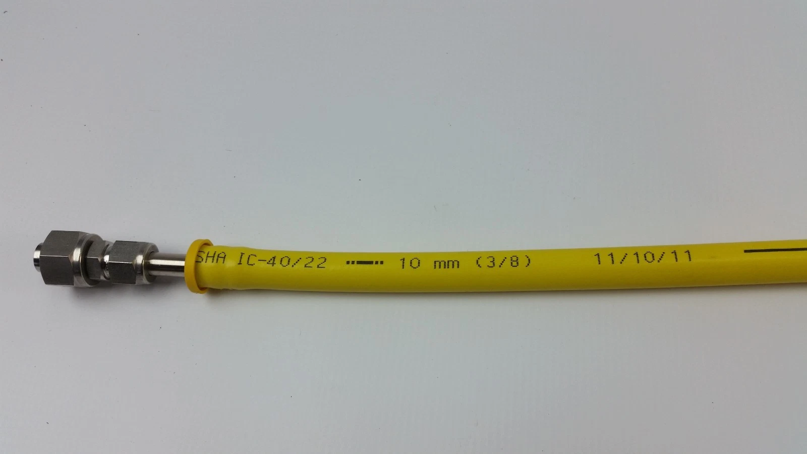 Hex-nut tube fitting end of a Parker 801-6 hose with MSHA IC-40/22 and 10 mm (3/8) print
