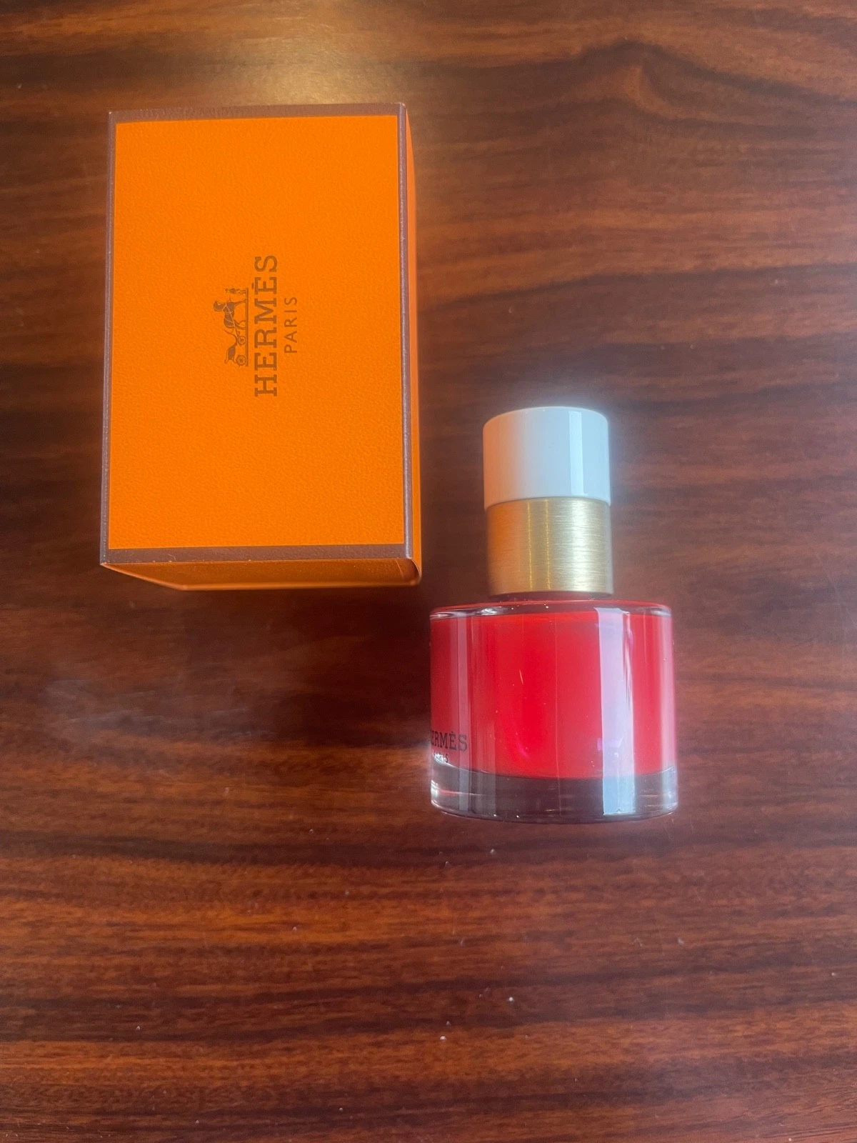 Hermès Nail Varnish - 64 Rouge Casaque RRP £47
Opens in a new window or tab