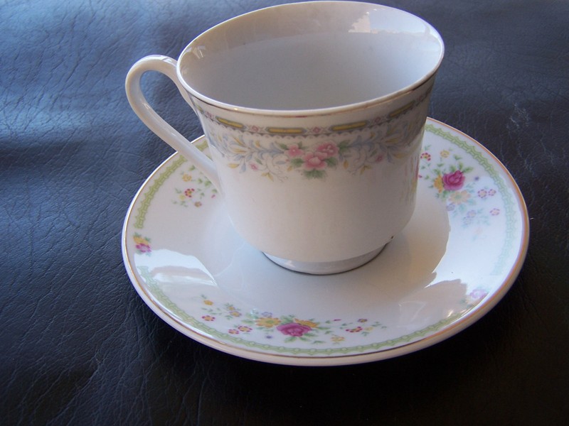 NICE VINTAGE UNMATCHED CUP AND SAUCER FLORAL DESIGN CHINA MADE