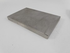 The Beadsmith Steel Bench Block Flat Anvil 6 x4 x 0.5 " -Distressed Packaging