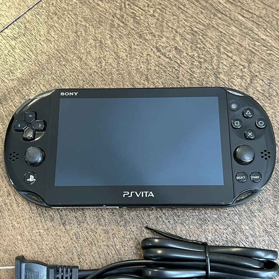 Sistema Sony PS Vita 2000 negro con cargador - probado funciona - sin región Foto 2 de 4
