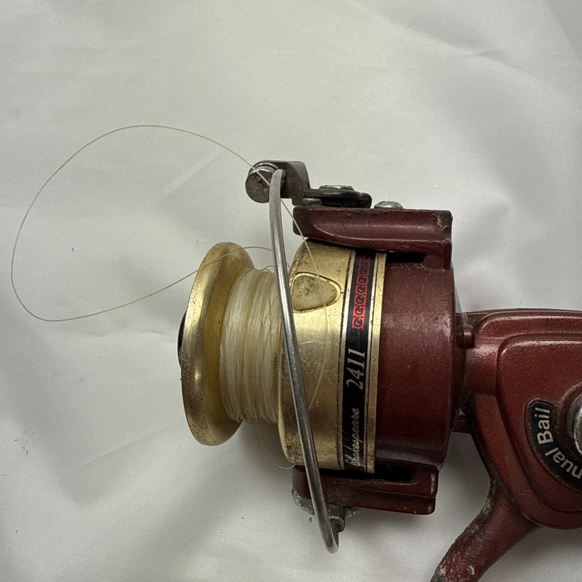 Vintage Shakespeare 2411 Spinning Fishing Reel Red Gold Vintage