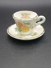 POLLY-ANNA FINE BONE CHINA MADE IN ENGLAND Miniature cup and saucer of mouth
