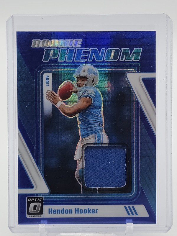 HENDON HOOKER 2023 OPTIC ROOKIE PHENOM BLUE PRIZM ROOKIE JERSEY PATCH Q7188