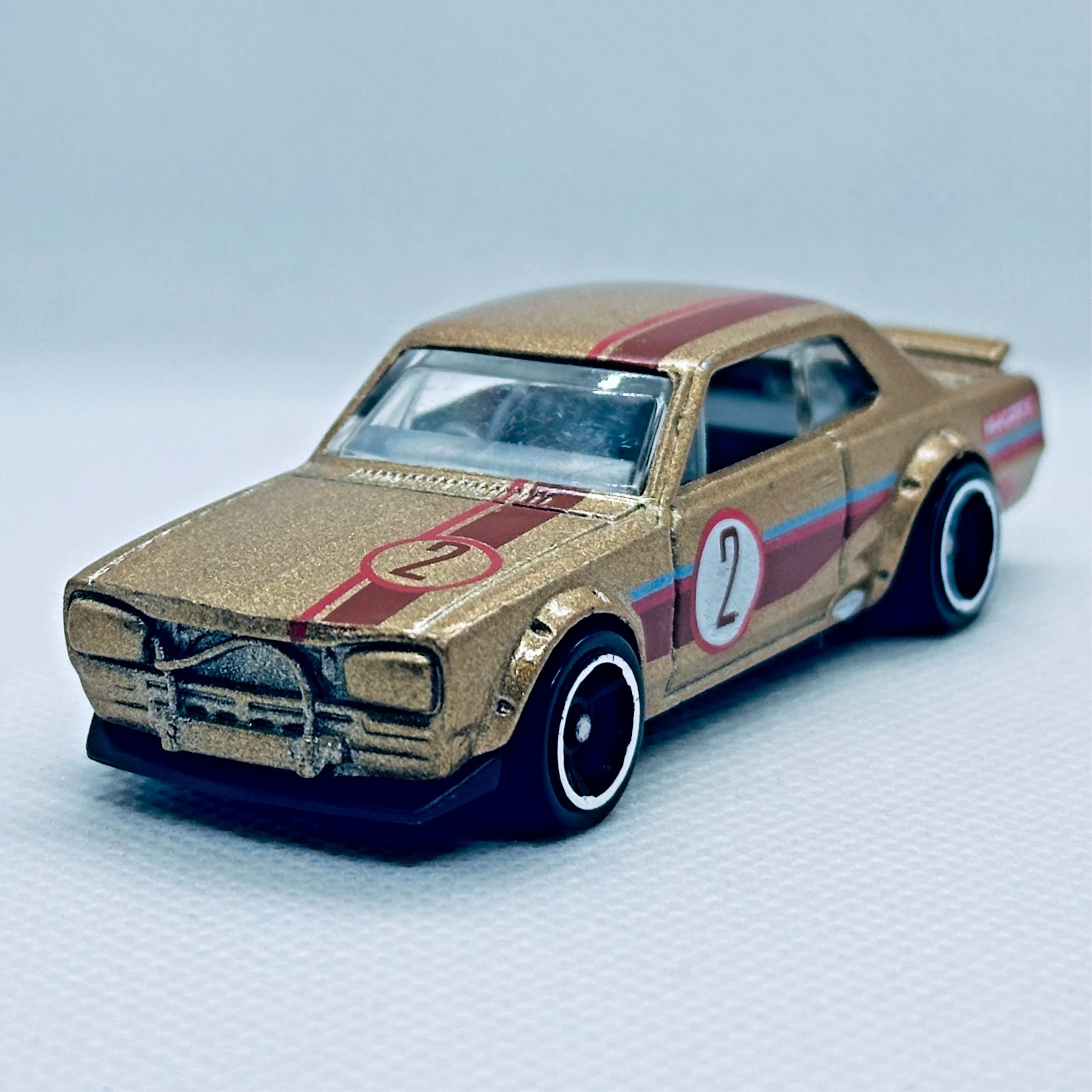 Hot Wheels 2011 Nissan Skyline H/T 2000GT-X Gold Toy Car