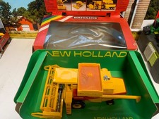 BRITAINS.1:32.FARM.NEW HOLLAND TR85.COMBINE HARVESTER. COMBINE.BOXED.SHOP HEADER