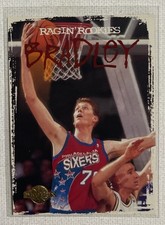 1994-95 Skybox Basketball Shawn Bradley Raging’ Rookies Insert Card #19 76ers