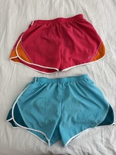 2 pairs of ASICS running shorts - bothMedium; blue; pink/orange