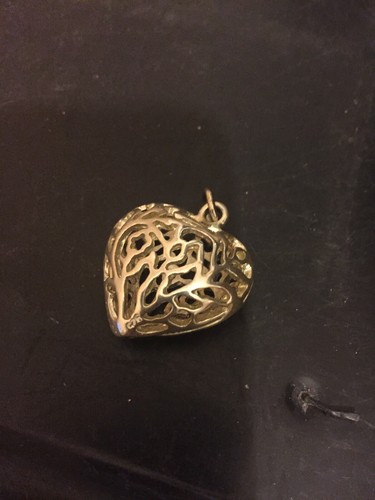 White Metal Carved Heart Shaped Pendant