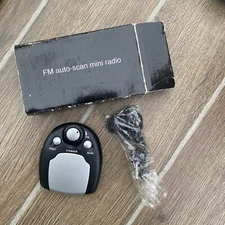 NIB Avon Vintage FM Auto Scan Mini Radio Wired Ear Buds Belt Clip Battery Power