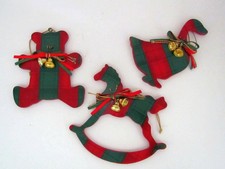 A Trio of Green and Red Plaid Wood Tree Ornaments