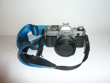 Canon AE-1 35mm SLR Film Camera with 50mm f/1.8 Lens w Strap