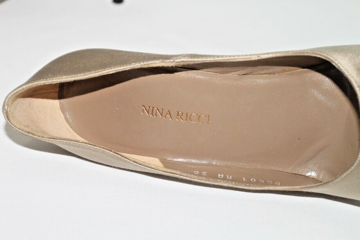 Nina Ricci Gold Satin Round Toe Twisted Stiletto Platform Pumps