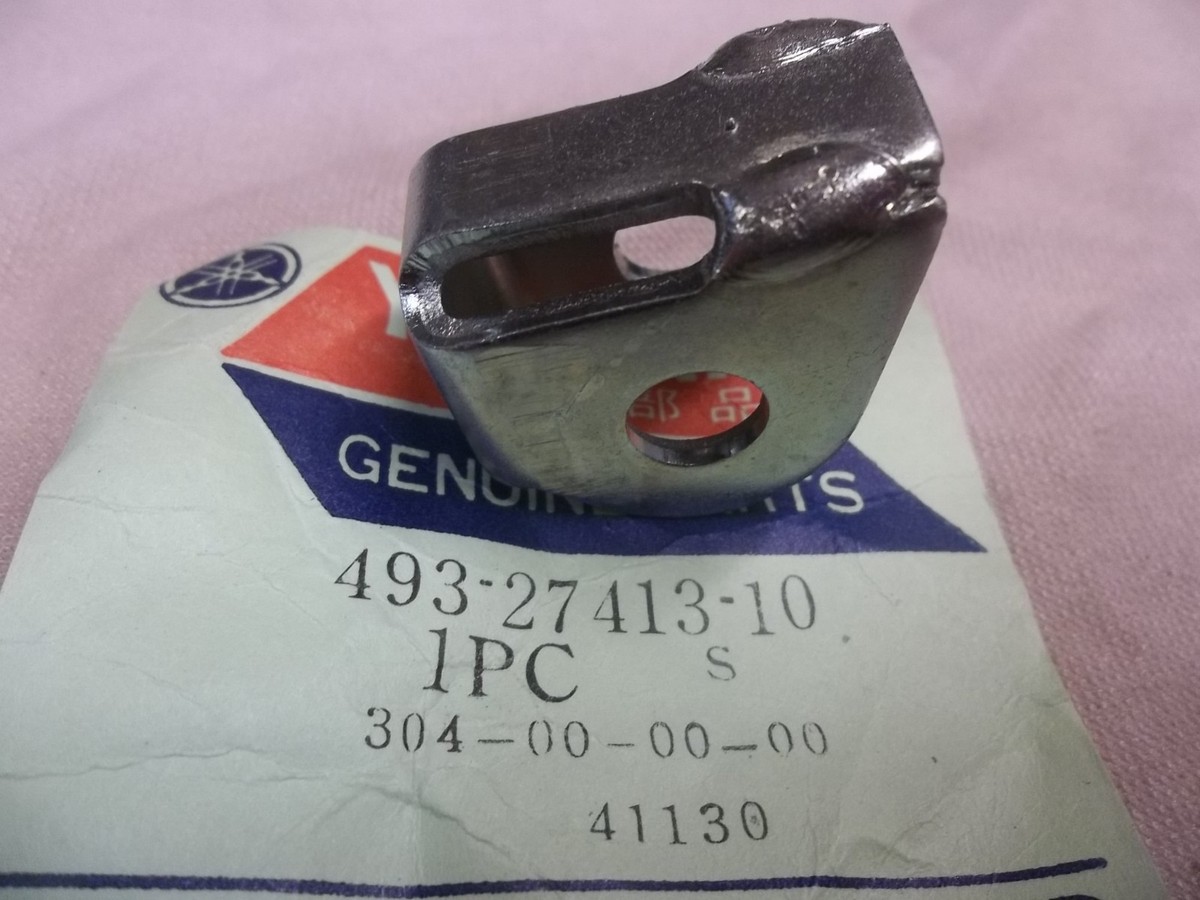 YAMAHA NOS/OEM FOOTREST FOOT REST PEG COVER BRACKET TY250 1976