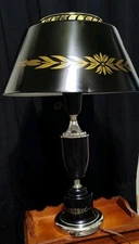Vintage MCM table lamp toleware black w/gold painted trim. Works