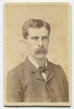 MAN WITH PRETTY EYES AND BOLD MUSTACHE. CDV. NEWARK, N.J.
