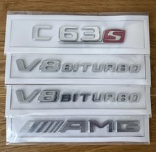 Komplett-Set für Mercedes C63s AMG V8 Biturbo Schriftzug-Embleme Komplett-Set für Mercedes C63s AMG V8 Biturbo Schriftzug-Embleme