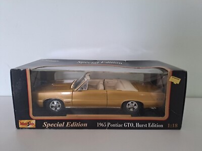 VINTAGE MAISTO 1/18 - 31884 1965 PONTIAC GTO HURST EDITION - GOLD