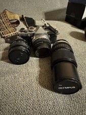 Olympus OM-1 35mm SLR Film Camera W/ extra Lenses