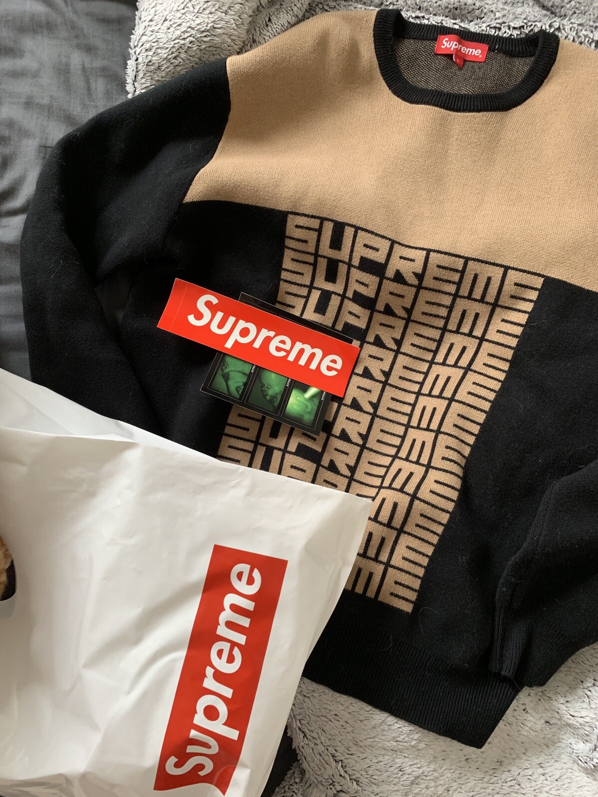 supreme logo repeat sweater