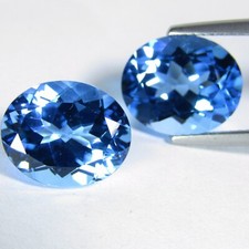 10.44Cts Dazzling Natural Swiss Blue Topaz 12x10mm Oval Shape Matching Pair
