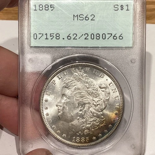 1885 P Morgan Dollar PCGS MS62 OGH (Rattler Cracked From a Second Gen OGH) Toned