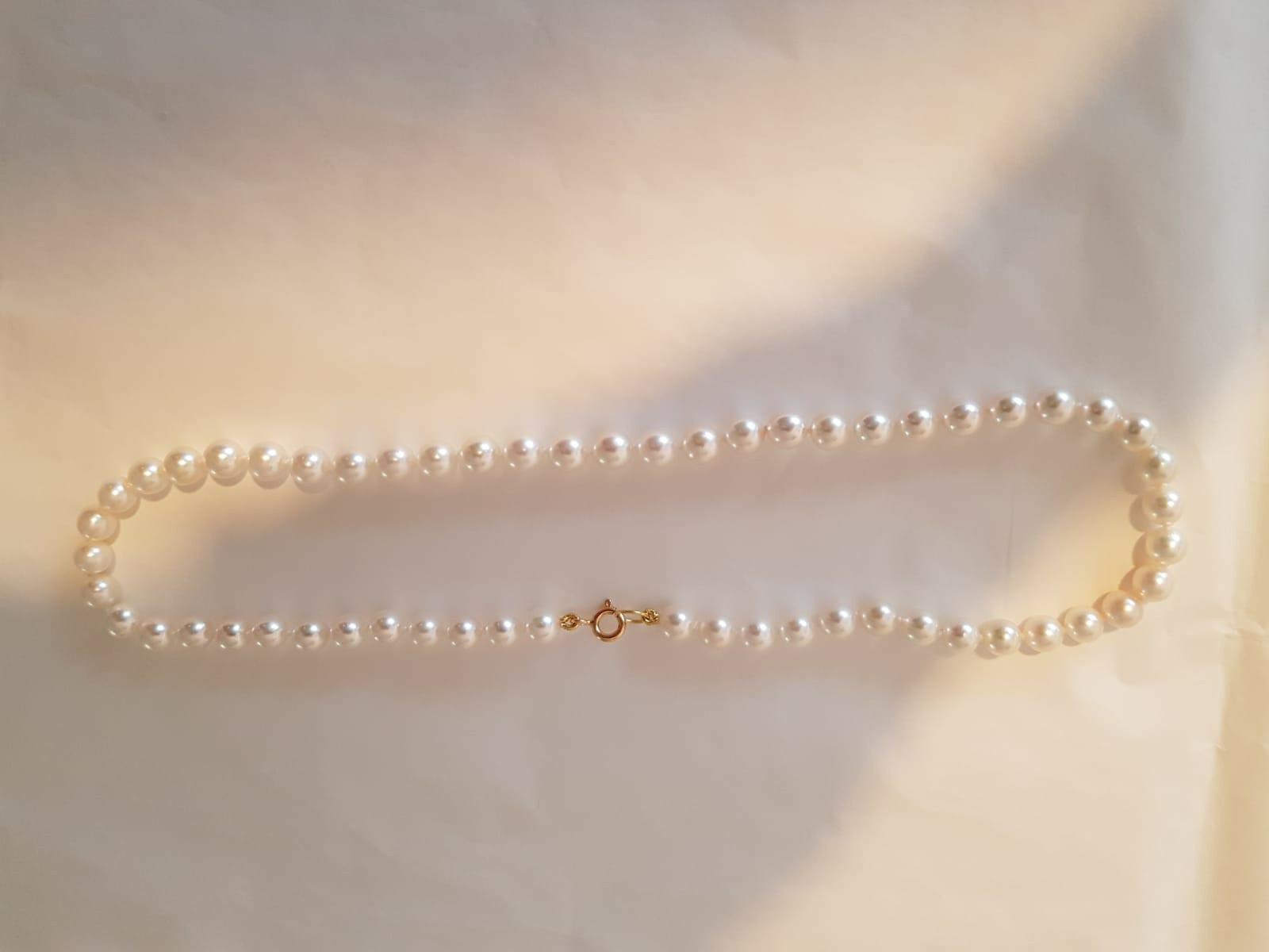 ORECCHINI PERLE COLTIVATE AKOYA GIAPPONESI 6.5 MM E DIAMANTI CT. 0.03 | Biffi Gioielli