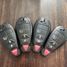 LOT OF 4 DODGE RAM 1500 2500 3500 KEYLESS 4 B...