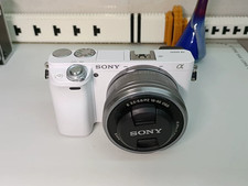 Sony A6000 ILCE-6000 Digital Camera w/ 16-50mm Lens English -95 NEW