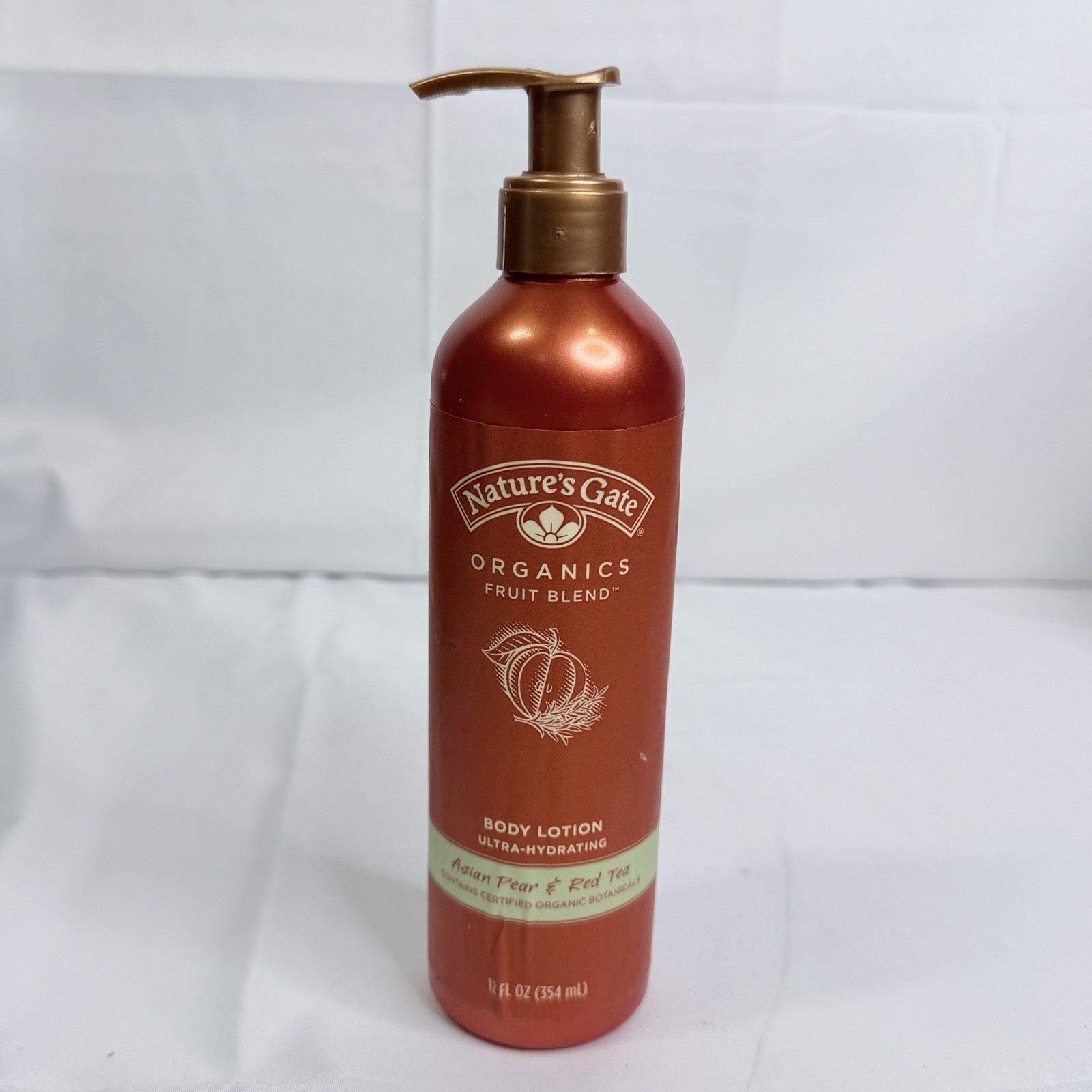 Loción corporal Nature’s Gate Organics asiática de pera y té rojo 12 oz ultra hidratante