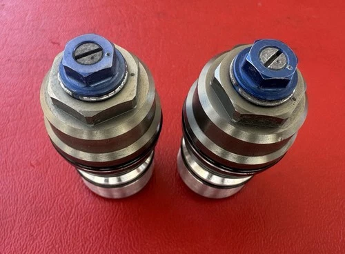 PIECE, ADJUSTER LOWER
