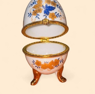 Vintage Porcelain Egg-Shaped Trinket Box with Floral Pattern and Gold Tone Legs