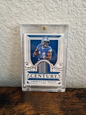 2025 Panini National Treasures - Century Materials Amon-Ra St. Brown /99 (MEM)