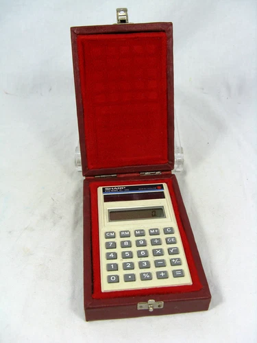 Orignal boxed 80´s calculator Taschenrechner SHARP EL - 345 solar working