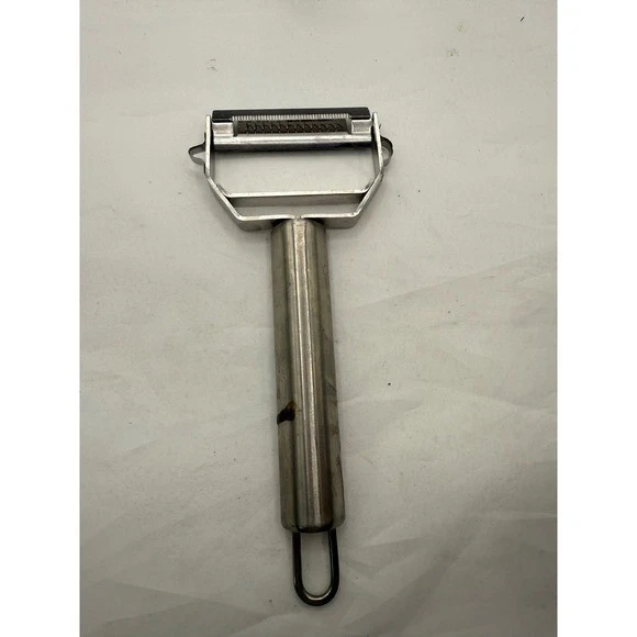 Utensilio de cocina pelador de cuchillas giratorias de acero inoxidable Titan 2 Foto 4 de 4