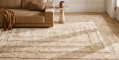 Hand knotted from New Zealand wool, the natural fiber adds organic shading and