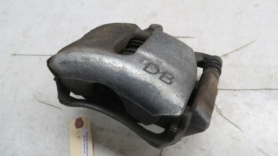 Pinza de freno delantera izquierda Volkswagen Jetta MK7 2019-2021 OEM Foto 4 de 4