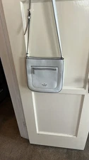 White Kate Spade crossbody bag with silver hardware #crossbodybag